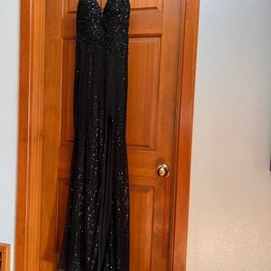Dress style: black, shimmery, corset back